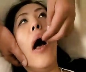 Sexy Oriental lady has a kinky guy shoving his hard dick in